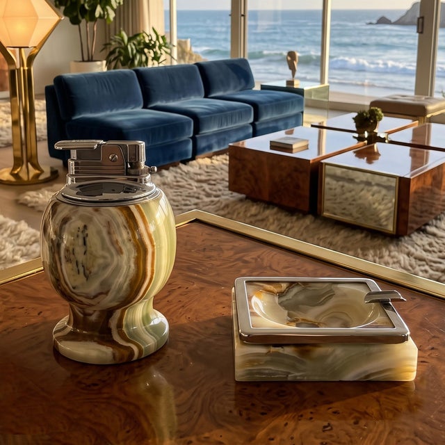 Exquisite two-piece smoking set, beautifully crafted in Italy during the 1960s. The set includes a striking table lighter...