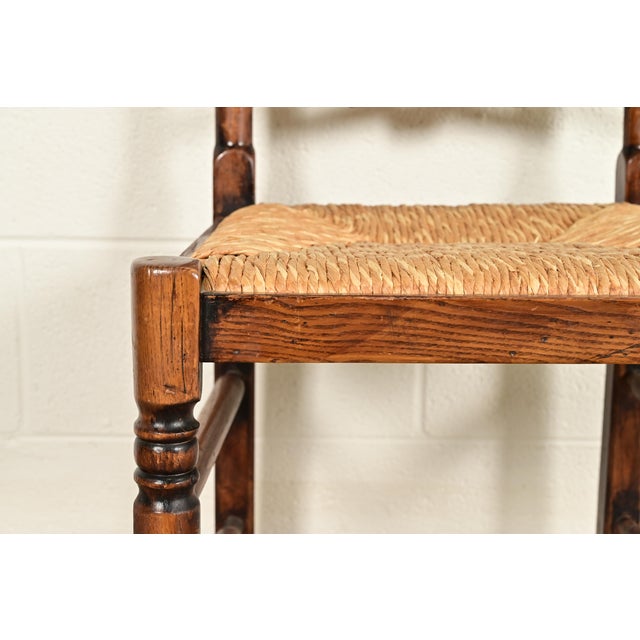 Brown Baker Furniture Style English Country Rustic Carved Solid Oak Ladder Back Dining Chairs With Rush Seats, Pair For Sale - Image 8 of 13