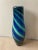 Mid-Century Eastern Blue swirl hand blown vase. Vase measures 15 inches high and 6 inches at the widest point and 2.5...