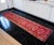 Woven in the 1960s in Southeastern Anatolia, this striking hand-knotted runner rug brings vibrant energy and historic...