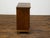An Italian oak small cabinet from the early 19th century, with single door and geometric carved motif. Created in Italy...