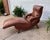 An amazing whisky brown contour lounge chair which is sure to please in comfort and vibe! This deluxe model features...