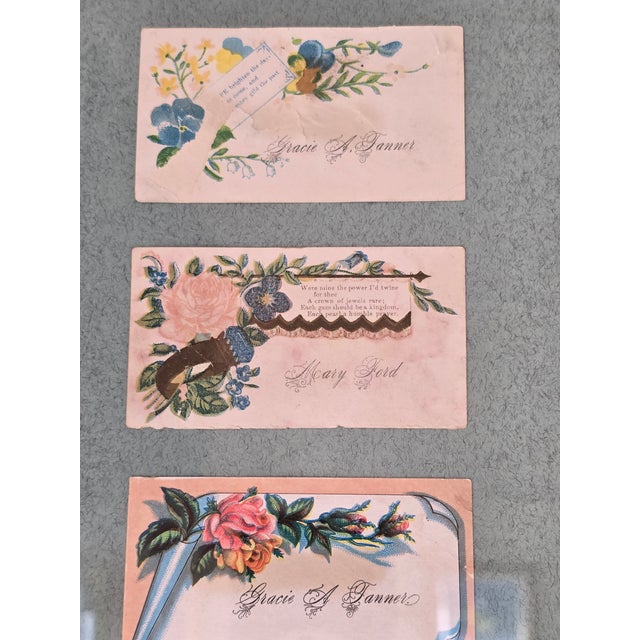 A beautifully curated collection of authentic 19th‑century calling cards, elegantly arranged in a long horizontal...