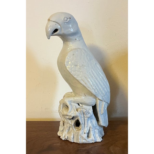 Antique 18th century Chinese blanc de Chine white porcelain figure of a parrot perched atop rock work. Exceptional quality...
