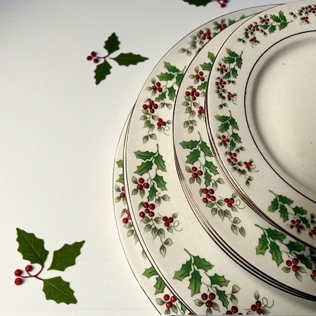 A Holiday dinnerware set featuring 33 essential pieces of Gibson's Holly Berry Everyday Holiday China Collection. Designed...