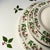 A Holiday dinnerware set featuring 33 essential pieces of Gibson's Holly Berry Everyday Holiday China Collection. Designed...