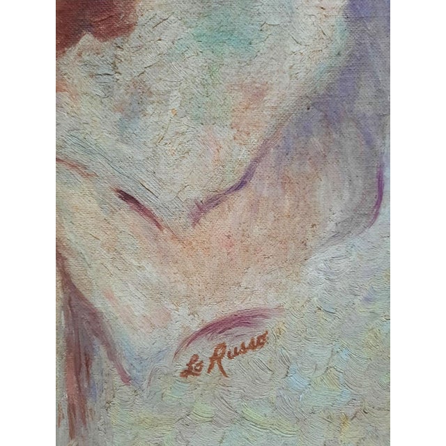 Presenting an expressive mid-century oil portrait of a sad clown, signed Lo Russo in the lower right corner. The painting...