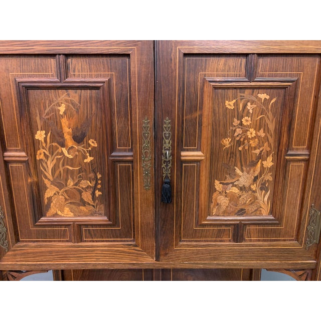 A stylish Arts & Crafts period rosewood parlour cabinet, or chiffonier. Well constructed in solid rosewood with attractive...