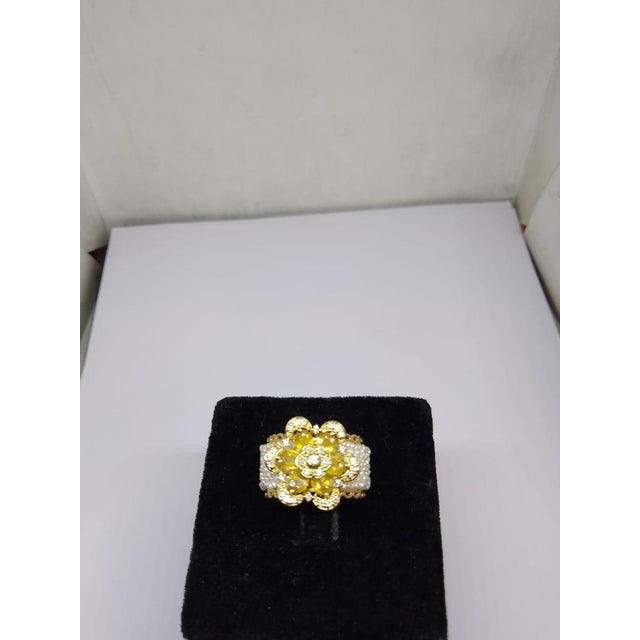 Gemstone details Gold Purity: 18K Solid Gold Yellow sapphire: 1.50 cts Diamond: 0.22 cts 18K gold Net weight: 6.98 grams...
