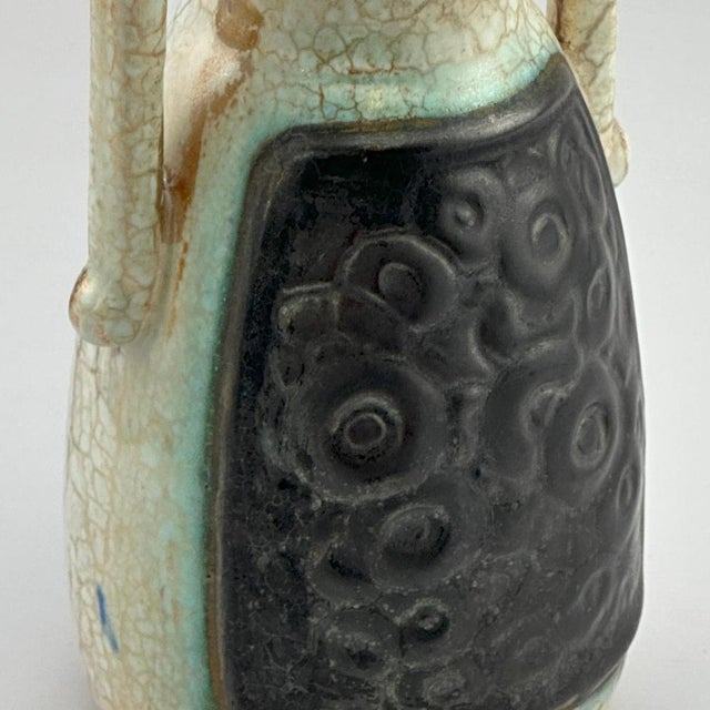 A striking small-scale ceramic vase from the 1930s, crafted by Ditmar Urbach—one of Czechoslovakia’s leading ceramic...