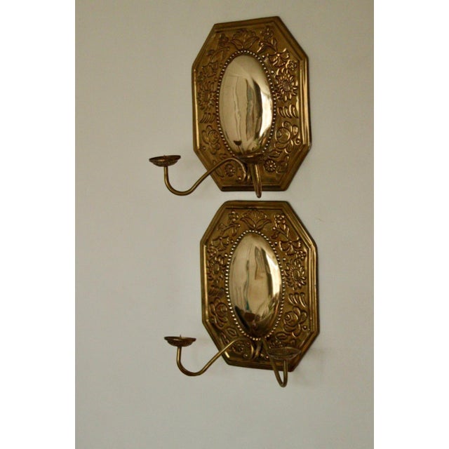 Pair of Mid-Century Swedish Brass Octagonal Double Arm Sconces Elegant Swedish mid-century brass wall sconces featuring a...