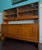 This striking two-piece Danish Modern teak sideboard and hutch was designed and manufactured by the elite workshop of...
