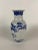 Round Chinese export porcelain vase with hand painted blue floral decoration and birds.