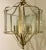 Stylish Currey & Co. seeded glass transitional Ladock lantern, iron frame finished in champagne silver, showroom floor...