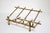 Vintage magazine rack made of faux bamboo brass. It perfectly fits the mid-20th century Hollywood Regency style,...