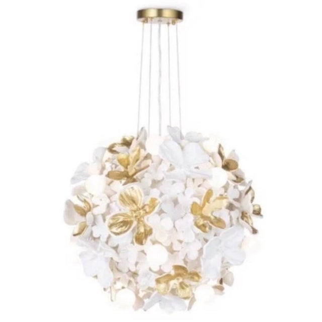 Authentic Regina Andrew Dogwood Chandeliers. This is an original Regina Andrew fixture. The Chairish brand menu does not...