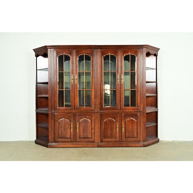 A gorgeous Georgian or Chippendale style lighted breakfront bookcase cabinet, display cabinet, or dining cabinet By...