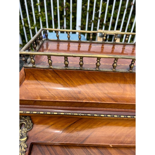 Louis The XV style parquet design roll top desk with red leather interior. It has a lot of bone inlay and metal ormolu...