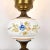 A very beautiful porcelain lamp was made in the 60s of the last century. Hand-painted porcelain complements yellow glass...