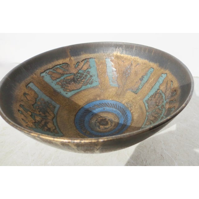 Ann Kinney studio Pottery, Fine ceramic bowl with a modern design. Metallic copper/brass glaze with an organic metallic...