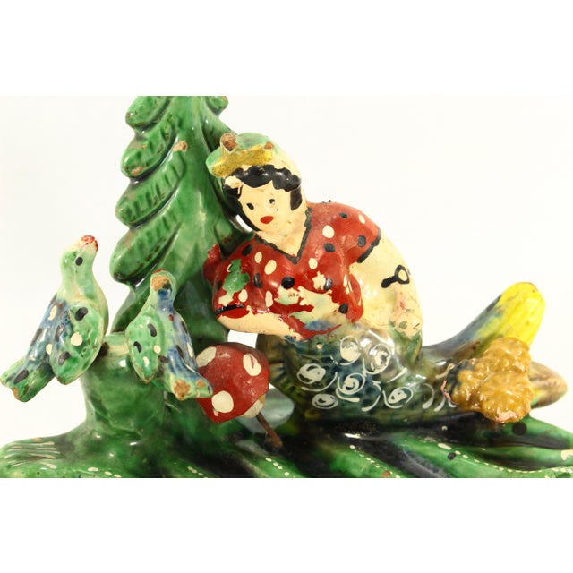 A very charming and extremely unusual piece of Folk Art Made of terracotta redware with majolica glaze, additionally...