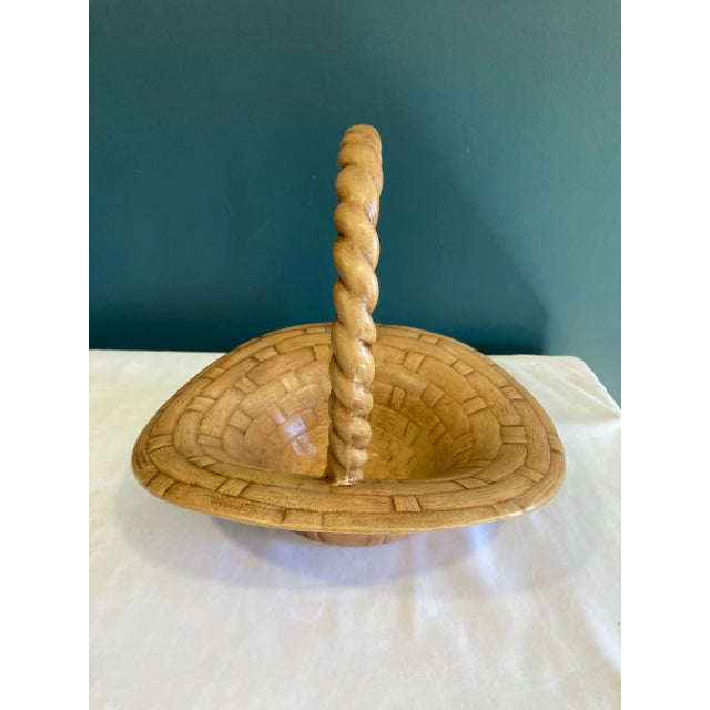 Very nice hand painted ceramic basket. 1951 on the bottom. In excellent vintage condition!