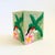 A vintage hand made crochet tissue box cover with a hummingbird design on each side. Measures 4.75"Square x 5.5"H