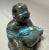 This vintage hand carved Buddha sculpture is carved out of natural Labradorite crystal stone, making it a unique and...