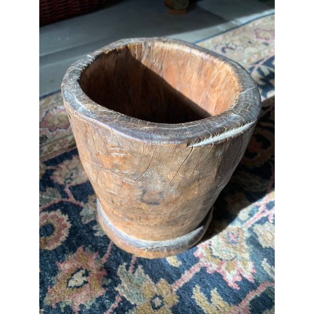 Here we have a neat old rustic wood mortar. I'm not sure if it's Asian or African or what, but the estate where I...