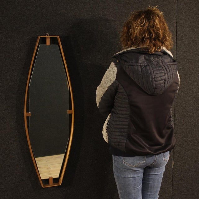 Italian mirror from the 1960s. This piece of furniture was designed and produced by Santambrogio and De Berti and is made...