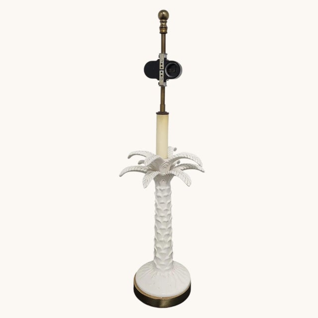 Bring effortless Palm Beach Regency glamour to your space with this striking vintage white porcelain palm tree table lamp....