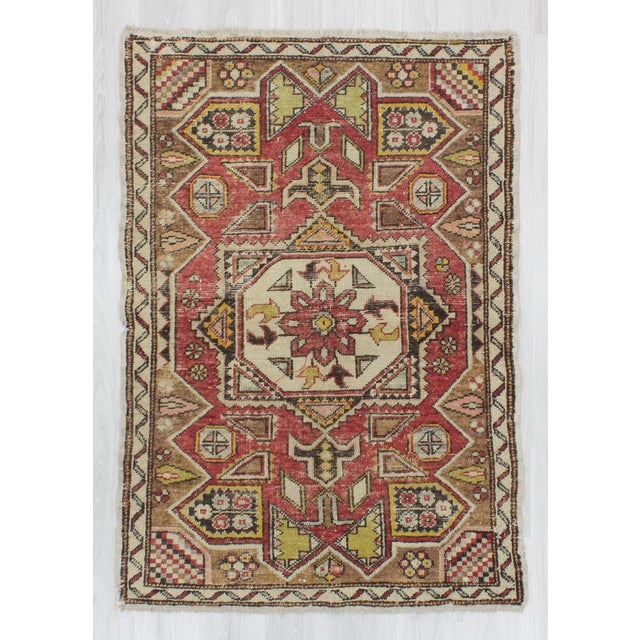 Offered is a vintage distressed Turkish rug from Konya region of Turkey. In good condition. Approximately 45-55 years old.
