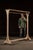 Painted wooden garment rack with a long, low-profile rectangular top rail supported by turned uprights and curved bracket...