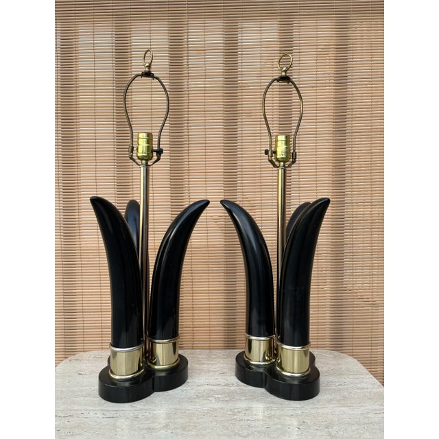 A Pair of Vintage Mid Century Modern Sculptural Table Lamps. Circa 1970s. Feature three black lacquered horn shaped...