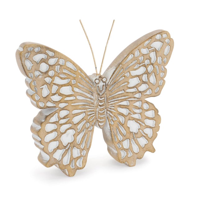 Bring a light and airy touch to your decor with this set of butterfly figures, featuring intricate cutout wing detailing...