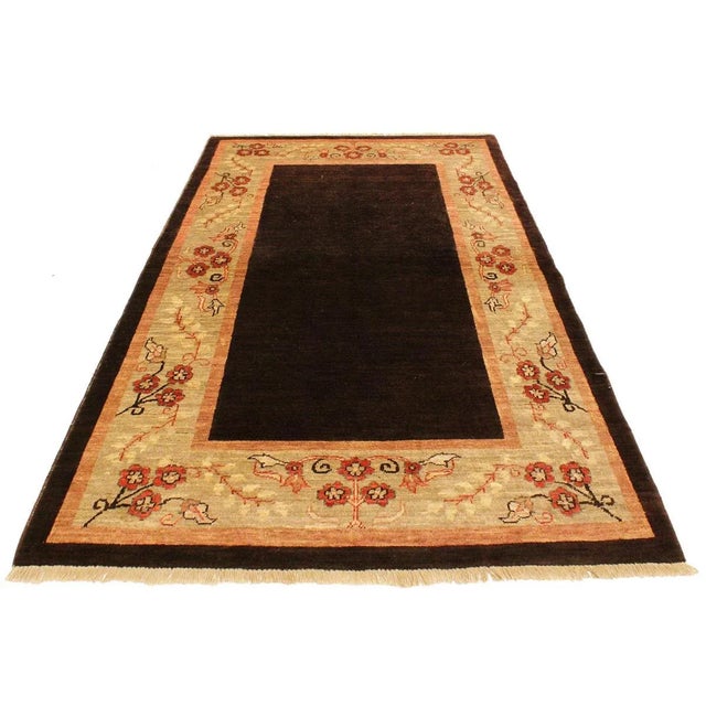 Create a new dimension of style in your home with this gorgeous hand-knotted rug wool rug. With hues of brown, rust and...
