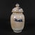 Decorative small lidded melon jar finished in aged‑style crackle porcelain glaze. The body features a classic Chinese...