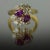18k Hand fabricated ring by Keith Davis with 2 pink sapphires weighing 2.16 carats and 10 round diamonds weighing 1.51...