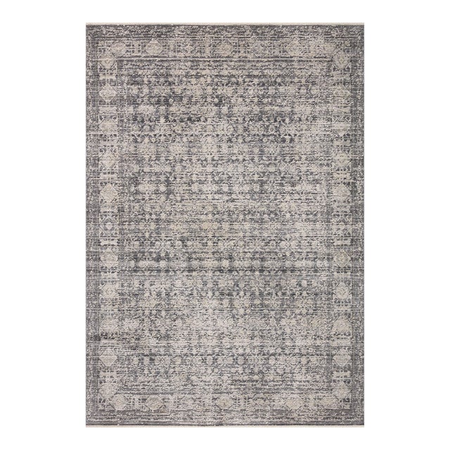Area rugs in the Alie Collection have an elevated antique look and plush, modern feel. The rug’s underlying traditional...