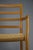 An elegant Model 68 armchair in solid oak with a hand-woven natural papercord seat, designed in 1981 by Niels Otto Møller...