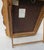 A fine portrait of a gentleman in a curious frame with a back stand to be a tabletop frame or a wall-hung painting....