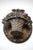 Oval Cast Iron Floral Door Knocker circa 1920. The Patina has aged, the original red and green colored flowers are faint...