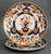 Set of Four Japanese Imari Porcelain Plates, with floral vase motif to center medallion, comprising of: two dinner plates...