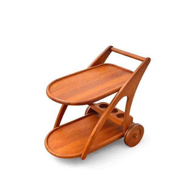 Danish Teak Serving Cart / Bar Trolley – Kjeni Merløse, 1970s. A true Scandinavian design rarity: a high-quality teak...