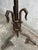 Brutalist wrought iron floor sculpture with a striking hand-forged hammered finish and architectural tripod base. The raw...