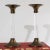 Striking Hollywood regency candlestick holders crafted from clear lucite and brass. Designed with tall cylindrical lucite...