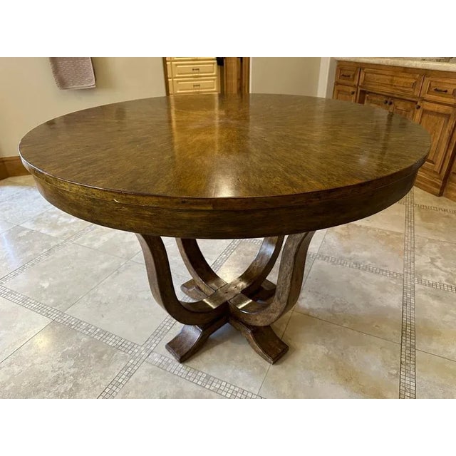 Round Wooden Pedestal Table By Artifacts International 3"10"R X 2'10.5"H Table is made of solid alder with custom finish....