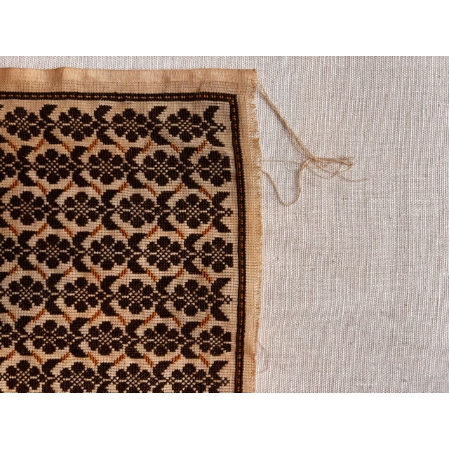 Vintage hand-embroidered textile panel or placemat. Features an intricate all-over stylized botanical pattern enclosed by...