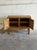 Beautiful vintage Danish oak cabinet in the style of Henning Kjærnulf, featuring richly grained solid oak, decorative...