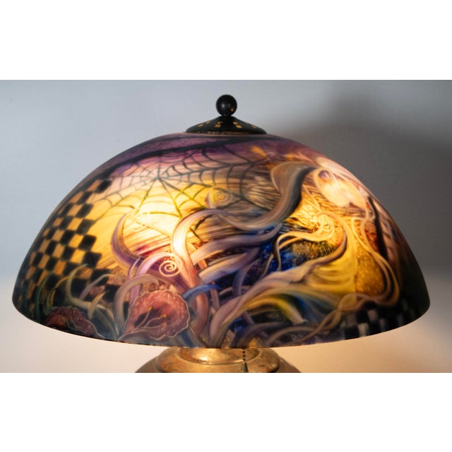 Ulla Darni (1937 - 2022) -Reverse Painted Lamp - 21" H x 18 1/2" W About the Artist Ulla Darni was a contemporary glass...